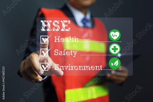 Quadro su tela health safety environment concept with a safety staff pointing to manage the wor