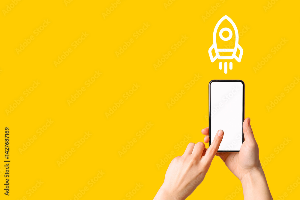 Person tapping smartphone screen with a rocket icon, ready for innovation