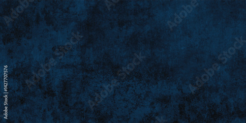 Mysterious dark blue textured background with an industrial and slightly rough feel.
