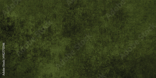 Close-up of a dark green grunge texture revealing intricate grainy details and rough surface.
