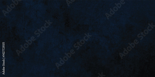Industrial-style dark blue concrete background with a textured and slightly mottled surface.
