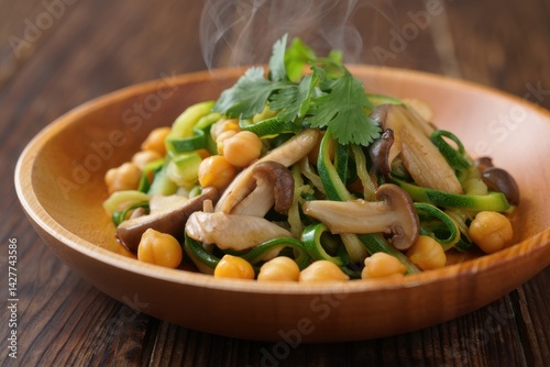 Vegan stir fry of mushrooms, zucchini and chickpea