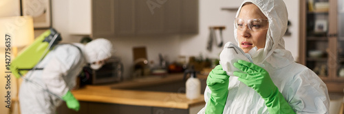 Header with woman in protective suit working in cleaning service