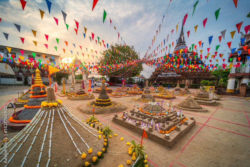 PHITSANULOK, THAILAND - April 10,2025: Thai people come to build the Sand Pagoda for return the sand to the temple on Songkran festival at Ratchaburana temple in Phitsanulok Thailand.
