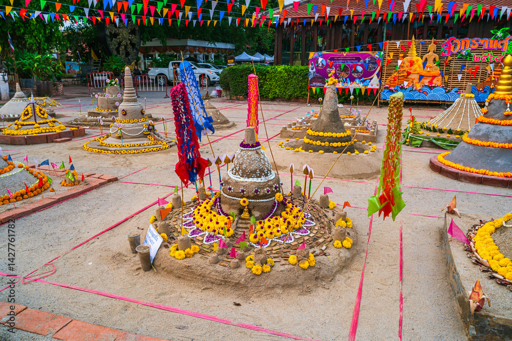 PHITSANULOK, THAILAND - April 10,2025: Thai people come to build the Sand Pagoda for return the sand to the temple on Songkran festival at Ratchaburana temple in Phitsanulok Thailand.