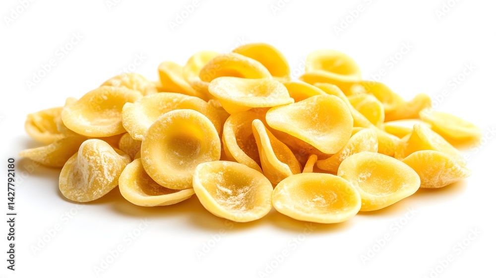 A close-up shot of a pile of uncooked orecchiette pasta on a white background shows its texture and shape perfectly. A close-up shot of a pile of uncooked orecchiette pasta on a white background shows its texture and shape perfectly.
