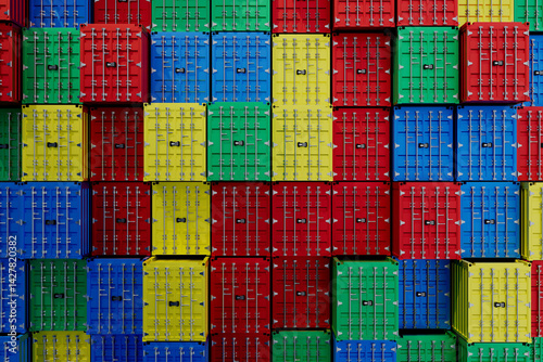 Obraz na płótnie A stack of colorful shipping boxes with numbers on them w salonie