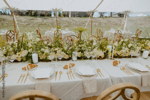 Reception Table Setting with Yellow Florals in Tent
