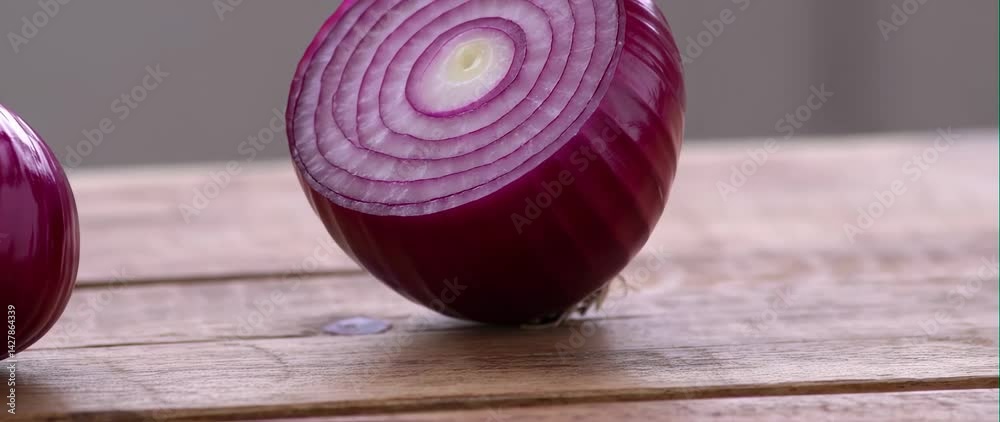 Anamorphic video of Closeup red onion 