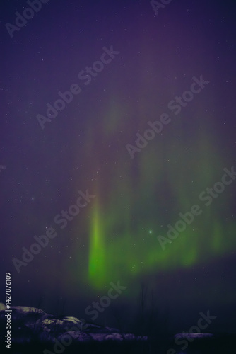 Obraz na płótnie Aurora borealis, polar lights with Milky Way stars. w salonie