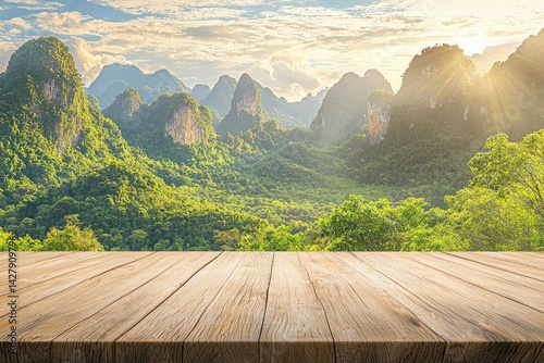 Wooden table top with a green valley and mountain landscape background, with sunlight for product display presentation mockup design in a sunny day nature concept