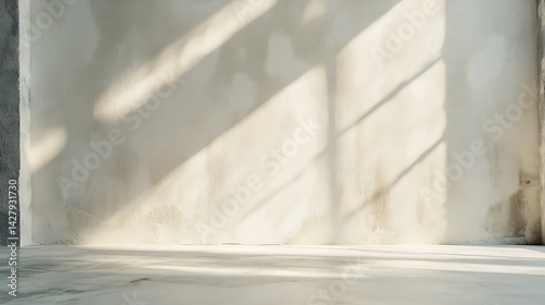 Smooth whitewashed wall with gentle warm light