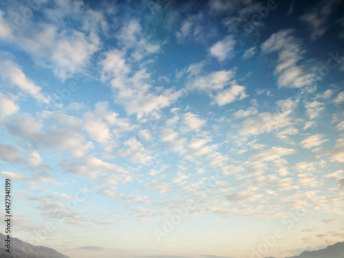 Altocumulus Cloud Layer over Mountain Horizon