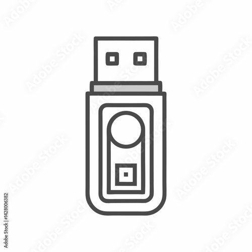 A sleek, gray USB flash drive, symbolizing data storage and digital technology.