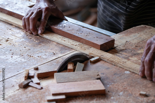 Sawing wood with a sawmill in a factory