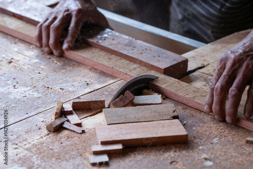Sawing wood with a sawmill in a factory