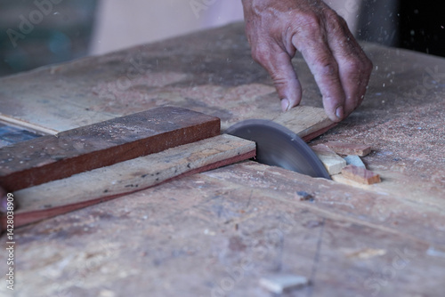 Sawing wood with a sawmill in a factory