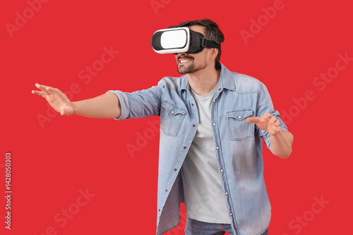 Handsome man using VR glass...