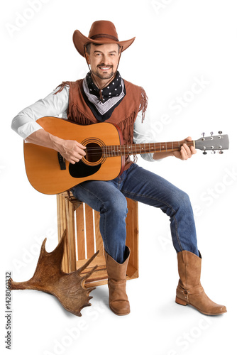 Handsome cowboy playing gui...