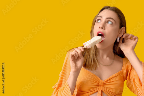 Young woman biting white ch...
