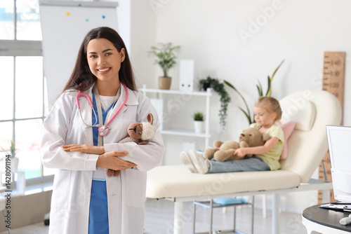 Female pediatrician with st...