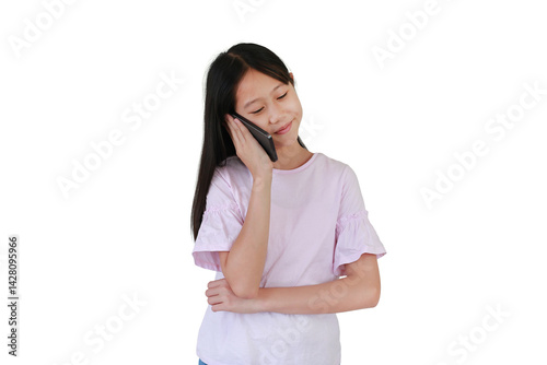 Obraz na płótnie Portrait of Asian girl child talking on the mobile phone on white background. w salonie