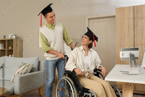 Female graduate in wheelcha...