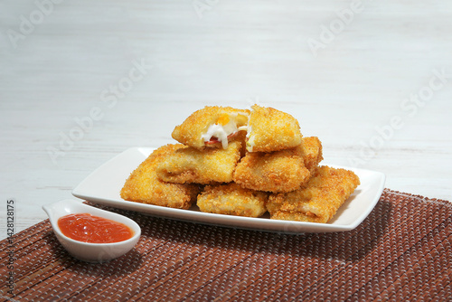 a plate of indonesian snack risoles
