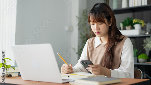Asian student woman online learning from home