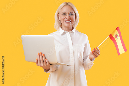 Mature woman with laptop an...