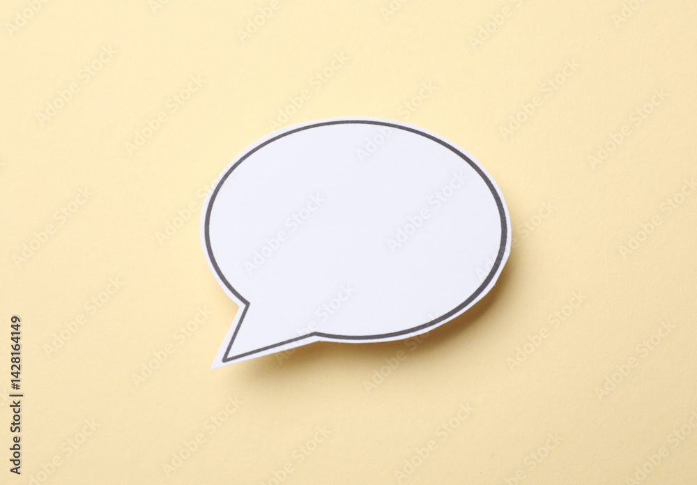Blank speech bubble on beige background. Space for text