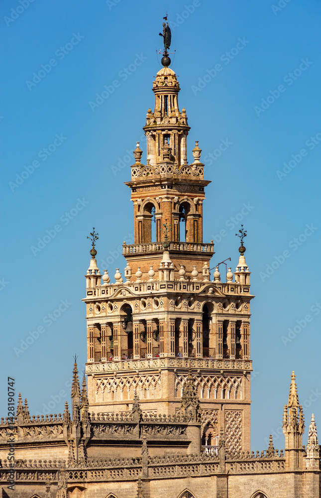 Giralda tower of Seville cathedral over old town, Spain