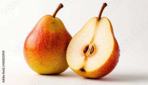  Juicy ripe pear and its halved counterpart displayed on a clean white background, highlighting the fresh texture and vibrant colors of the fruit. Perfect for healthy eating concepts.
