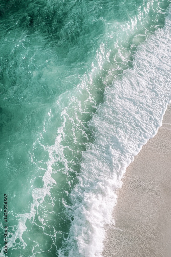 Turquoise waves crash on a sandy shore Turquoise waves crash on a sandy shore