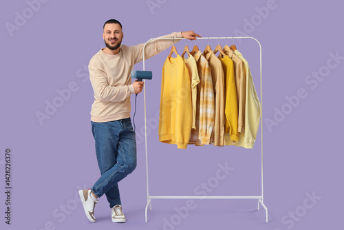 Young man with steamer and ...