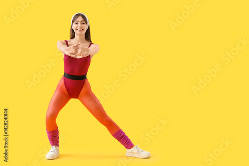 Sporty young woman doing ae...