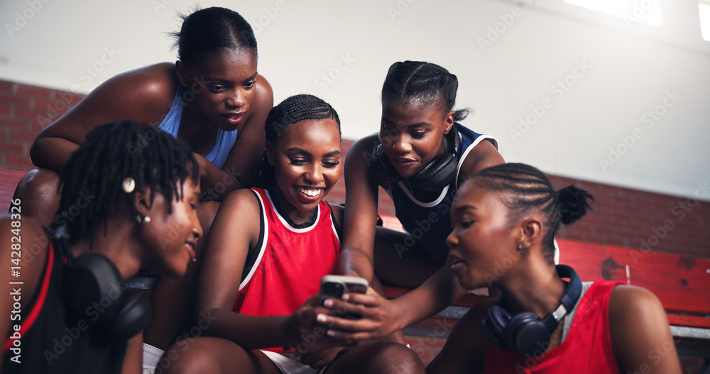 Obraz premium Sports, athlete and group with mobile, break and promotion for game on social media, smile and online. Basketball player, team and black women with smartphone for post, fitness and browsing on web