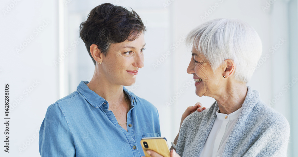 Fototapeta premium Phone, helping and person with senior woman for mobile app, internet and assistance in home. Retirement, caregiver and mom and adult daughter on smartphone for communication, online and telehealth