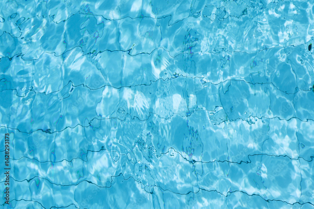 Obraz premium Background featuring the textured surface of rippling water in a swimming pool