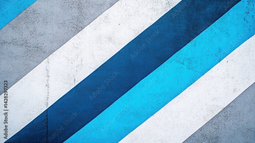 Fototapeta premium Diagonal stripes of white, gray, blue, and teal on a textured surface