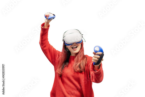 Obraz na płótnie Gamer winning virtual reality game wearing headset and holding controllers, celebrating with arms raised and excited expression on white background w salonie