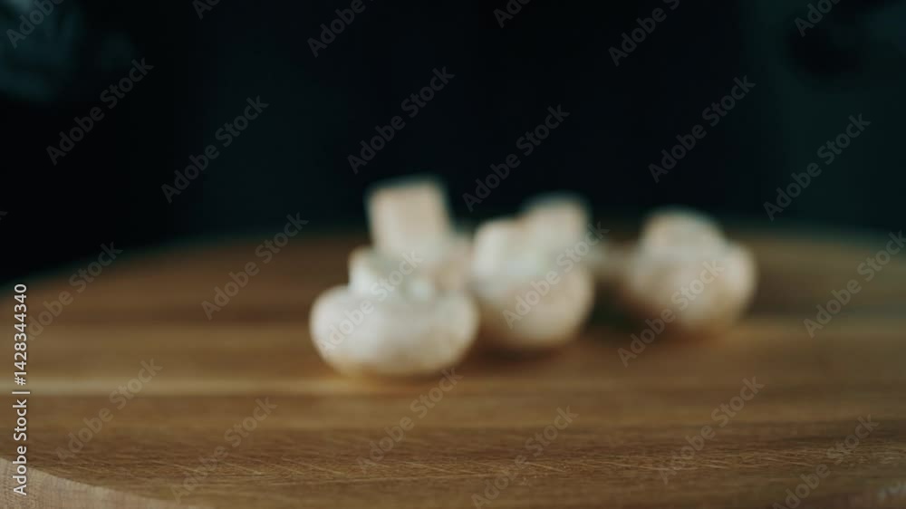 mushrooms on a board before slicing mushrooms on a board before slicing