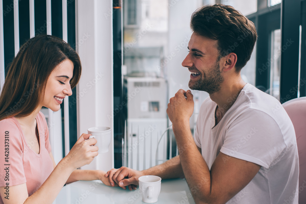 Smiling romantic couple on date in cafe Smiling romantic couple on date in cafe