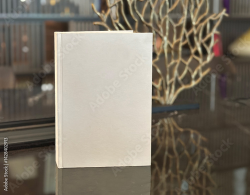 Book template with blank cover on the table for your design
