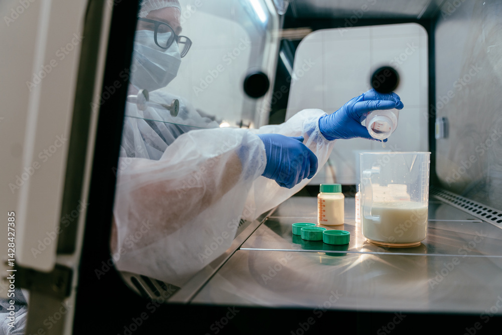 Measuring donor breast milk in neonatal lab Measuring donor breast milk in neonatal lab