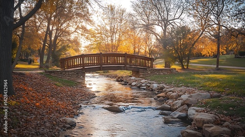 Wooden Bridge Over Autumn Creek Park Scene