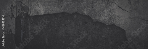 Obraz na płótnie Texture of old cracked concrete wall. Rough faded dark gray concrete surface with spots, cracks, noise and grain. Dark wide panoramic background for grunge style design. Shaded texture with vignette. w salonie
