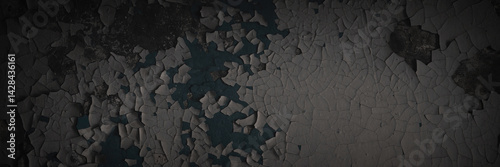 Obraz na płótnie Dark wide panoramic background. Peeling paint on a concrete wall. Dark grunge texture of old cracked flaking paint. Weathered rough painted surface. Patterns of cracks. Darkness background for design. w salonie