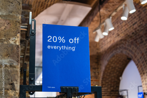 Blue Promotional Banner with 20 Percent Off Everything in Stylish Retail Store