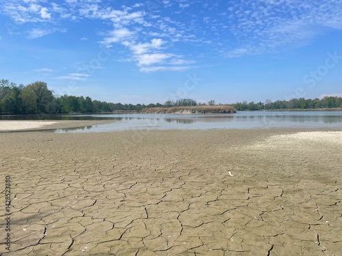 Dry bottom of a pond after heavy dry season 